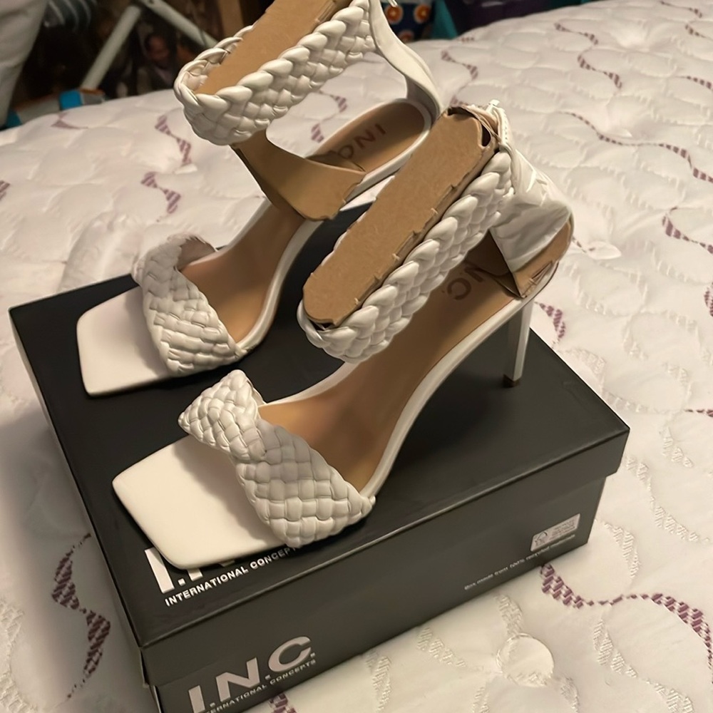 White INC heels. 10/5. These shoes have never been worn. The heel are 4 inches.